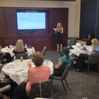 CREW SWFL networking luncheon - networking quality over quantity. CREW members at the presentation