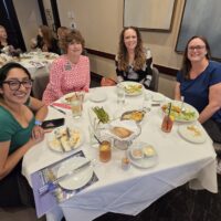 CREW SWFL networking luncheon - networking quality over quantity. CREW members at the presentation